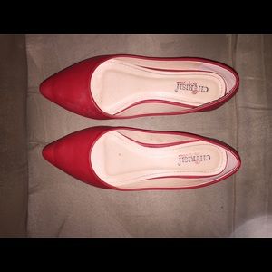 Gently worn red pointed flats by CHERISH from F21